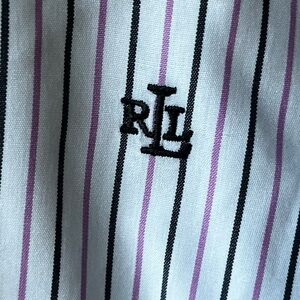 Ralph Lauren woman’s dress shirt.  Beautiful like new and super nice